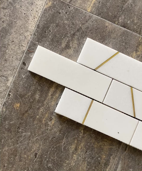 thassos and brass marble mosaic